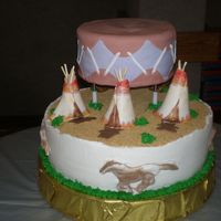 Native American Theme The drum is made of Fondant. Hoovering over a teepee village. This was for a multi national graduation party. Teepee's and horses were...