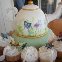 Teapot And Cupcake Teacups My mom hand painted the tea pot and we got the cupcake idea from here. Thanks CC!