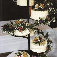 Spiral Wedding Cake Made this cake when I was in high school with my mom for one of my friends. Not a great picture but she really liked it!