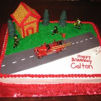 Fireman Cake This cake is bc icing with fondant road and graham cracker house.