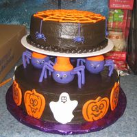 Halloween Spiders This is a different version of the Halloween cake in the Wilton Yearbook 2009. We left the pumpkin off and put the spider web. This is bc...
