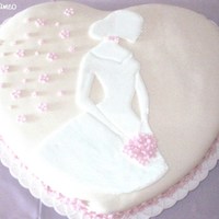 Bride Cameo Cake Covered in fondant. With a colorflow cameo.
