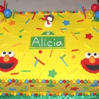 Elmo Cake 2 2" thick 12"x18" chocolate cakes with lemon cream cheese filling iced with pastry pride and decorated with fondant stars,...