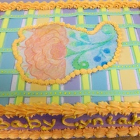 Baby Shower made to match the bedding of the baby on the way the picture in the center is an edible image. fondant strips to make the design