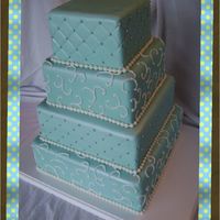 Tiffany Blue 4 Tier Wedding Cake 4 tier Tiffany Blue wedding cake covered in silver pearl dust.