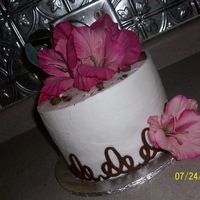 Top Cake For Cupcake Tower Used the cricut cake machine to do the border. White cake, buttercream.