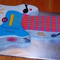 Colorful Guitar This was made for a little girl's birthday. All buttercream and details are MMF