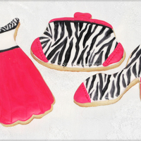 Zebra And Pink Cookies Sugar cookies decorated in fondant and painted with black food coloring with a fine paint brush