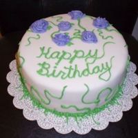 Mom's Flower Cake Made this for my mom's birthday. Wanted to make her a garden cake, but was limited on time. First time to do BC roses, need to work on...