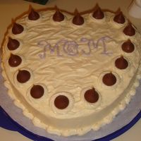 Mother In Laws Birthday Cake This is a heart shaped red velvet cake with cream cheese frosting and cherry cordial filled hershey kisses.