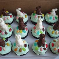 Easter Cupcakes These cupcakes were chocolate with white chocolate buttercream... the tastes was simply amazing. The bunnys are handmade using chocolate...