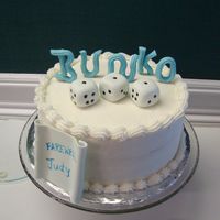 Bunko Cake Covered in buttercream with fondant letters, dice, and farewell scroll.