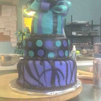 Fondant Tier Cake This cake I did in a class at the Blue Cake company. I was really proud of how it turned out. Each layer was a different flavor. Very...