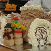Yule Log Yule log with buttercream icing and marzipan deco.