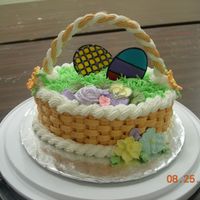 Basketweave Final For Course 2 This is my final for Wilton course 2. Flowers and handle are Royal frosting, the eggs are colorflow and everything else is buttercream....