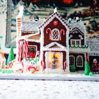 One Of A Couple Of Hundred Gingerbread Houses Over The Years All homemade gingerbread. Most of it is edible except this one had a metal rocking horse that Santa was riding on the front porch and the...