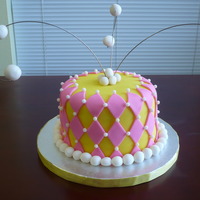 Pink & Yellow Birthday Cake This was a key lime cake I made for my best friend covered with buttercream and fondant. All decorations are fondant.