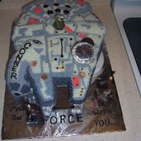 Star Wars "millenium Falcon" Cake This cake took 13 hours, by far my longest working time! I cut the shape out of a sheet cake pan then shaped the cockpit from the excess...