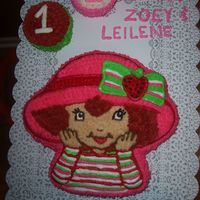 Strawberry Shortcake Strawberry flavored cake, this was a hit for the 1 year olds! I fixed the writing before the party, heehee!