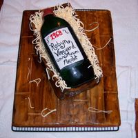 Wine Bottle Cake Entire cake (bottle and crate) is edible - board is covered in fondant and then painted with food coloring