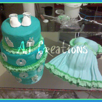 Baby Shower 2 tier buttercream cakes, the belly was made with fondant