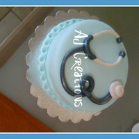 Md Birthday Cake the cover is made with rolled fondant and the "other thing" jajaja was made with gum paste in spanish is "estetoscopio"...