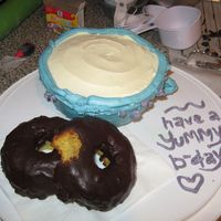 Milk And Doughnuts Cake I made this cake for my Mom's birthday. Her breakfast everyday is a doughnut and milk :) The cup of milk is a pound cake with...