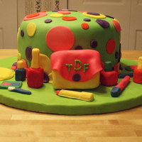 Makeup Cake &n Polka Dots This was made for a 3 yr old's Birthday party. The little girl loves makeup,polka dots, and bright colors. I made the makeup form...