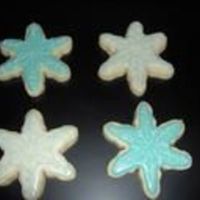 Snowflake Cookies Basic sugar cookies, simple glace icing. These were my first "real" decorated cookies. I did lots of them, but I think they...