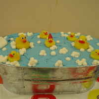 Rubber Ducky Tub These are actually cupcakes that were iced over for a "water" look. I built it up so the cupcakes would rest high in the tub. The...
