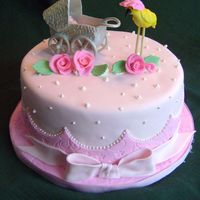 Baby In A Carriage The carriage and stork are made from gumpaste...