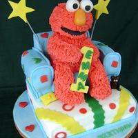 Furry Red Guy! My furry red guy was made from fondant covered marshmallow rice krispie treats! The cake was chocolate with vanilla butter cream.