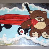 Red Wagon And Teddy Bear This is a cupcake cake made with 50 cuppies. Half are white cake with raspberry cream filling, other half are triple chocolate chunk. All...