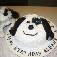Albany's Cake My grandaughter wanted a cake to match her Webkinz puppy. The cake is a 6" white cake covered in buttercream with MMF accents.