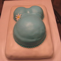 Baby Belly Yellow cake with rolled buttercream icing.