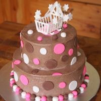 Baby Shower The cradle is royal icing, the cake is buttercream with fondant decorations.