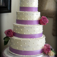 Simple Lavender Wedding Cake 12,10, 8, and 6 inch rounds to make up this massive cake.Travelled over 2 hours with this cake completely set up and was very nervous...