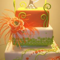 Boda De Color/partners Work This is a modern wedding cake, all decorations are in orange and green, this cake was prepare for a wedding show.