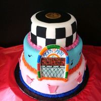 50's Themed Birthday Cake This was my first attempt at a fondant covered cake. I was happier with it than I thought I'd be, and the birthday girl loved it!...