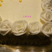 Non-Wilting Bc Roses Sorry I don't have a full cake photo. This one was a 50th b-day cake for my mother in law. I had made roses for the entire border and...