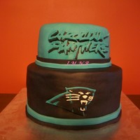 Panthers Cake Triple chocolate cake, with peanut butter filling and MMF. This cake was so yummy... It was made for my son's 12th birthday.