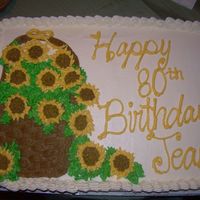 Sunflower Basket Cake My stepdad's mom's birthday came up and I'm the family baker... so I made her the Sunflower Basket. She loved it.