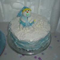 Snowman Baby Shower Baby shower cake for my grandson due in February. Fondant snowman and snowballs. Fluffy BC icing for "snow".