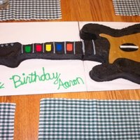 Rockband! This cake is to a full scale guitar. This was for my brothers 18th birthday. It was a snickerdoodle cake w/cinnamon buttercream. It was...