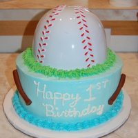 1St Birthday This is 8inch dbl covered in almond buttercream. The bats are mmf. The baseball is just a plastic hat that I cut the bill off of. It was...