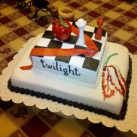 Twilight Cake Twilight cake showing an element from all three books. The figures are all MMF and painted with food coloring.