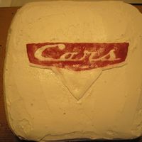 Cars Logo Frozen BC transfer. The cake is actually white, it's just the lighting that makes it look discolored.