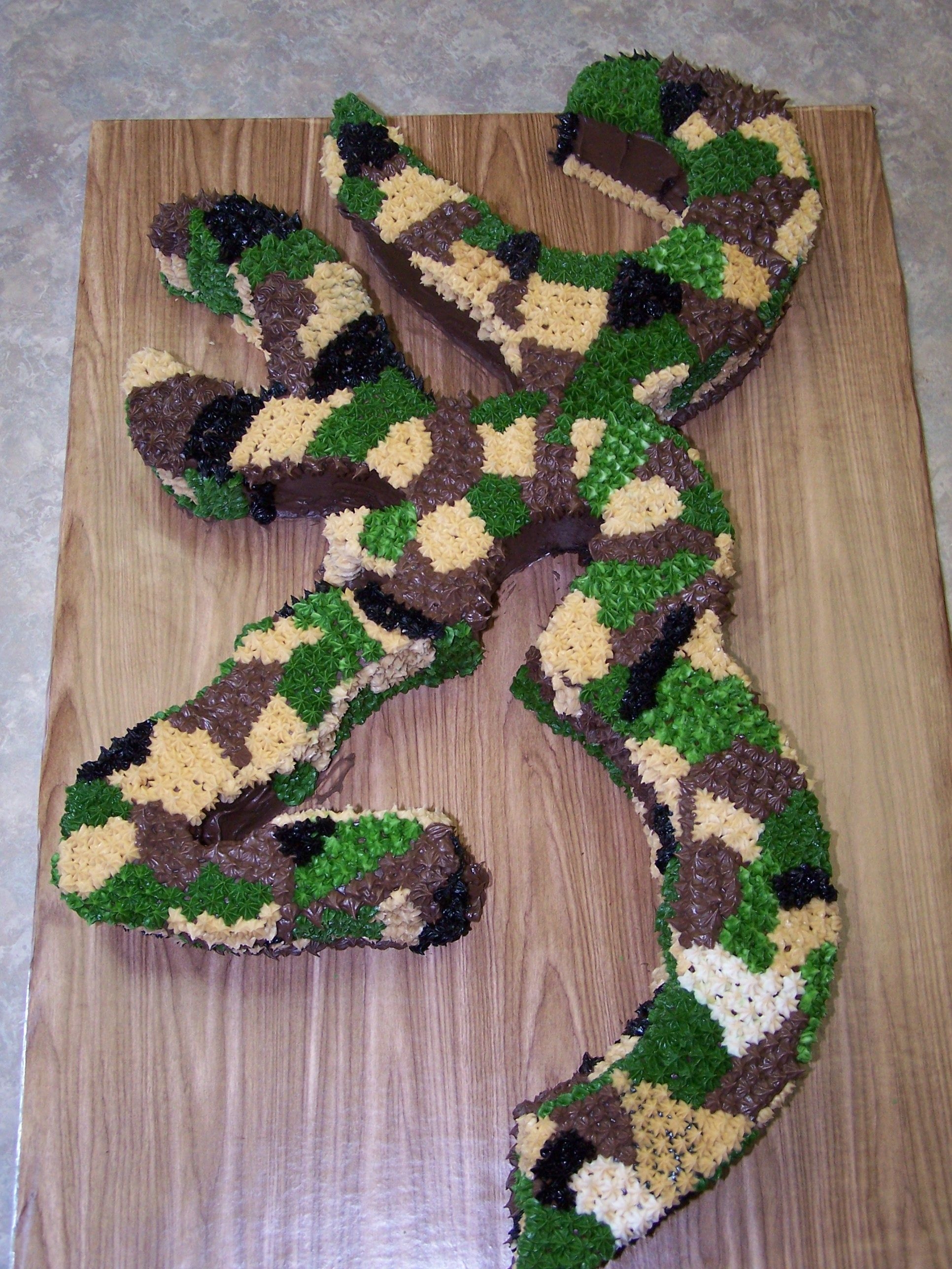 Browning Buckmark Symbol Chocolate cake with Camo Buttercream.