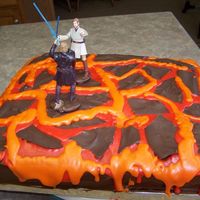 Star Wars 9X13 Peanutbutter cake with Chocolate Syrup icing with broken chocolate on top and melted bc lava in 2 shades. My son loved it. Thanks...