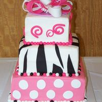 Cake_236.jpg Cake was all white with bc icing and fondant accents. It was way easier than anticipated. Loved the final outcome.